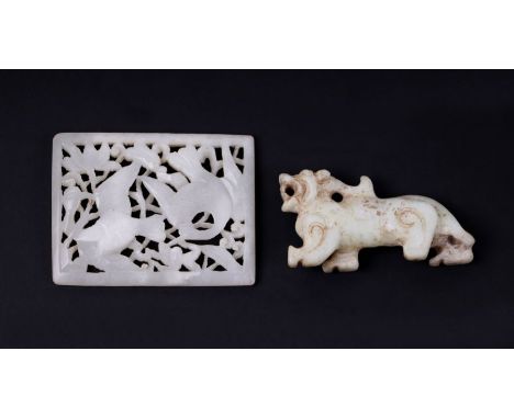 A Chinese jade or hardstone miniature panel depicting birds in foliage, 7cms wide; together with a similar dog of fo, 7cms wi