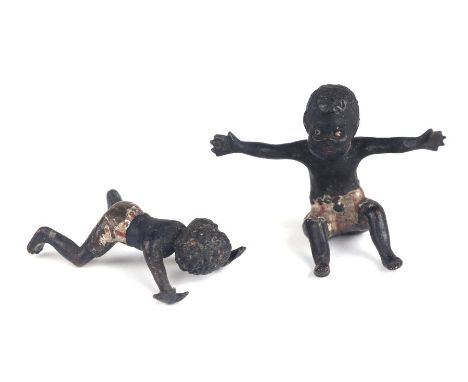 Two antique Vienna cold painted bronze miniatures depicting a seated black boy and a crawling black boy, largest 22mm high (2