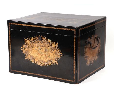 A 19th century Chinese black lacquer and gilt decorated display or shop tea caddy with decorated pewter liner, 33cms wide.Con