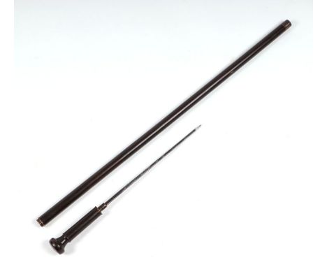 A hardwood swordstick with a short square tapering  blade, marked Solingen, 84cms long, blade length 28cms long.