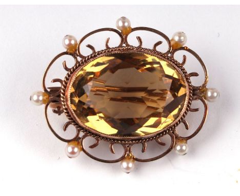A late Victorian / Edwardian yellow metal citrine and seed pearl brooch.