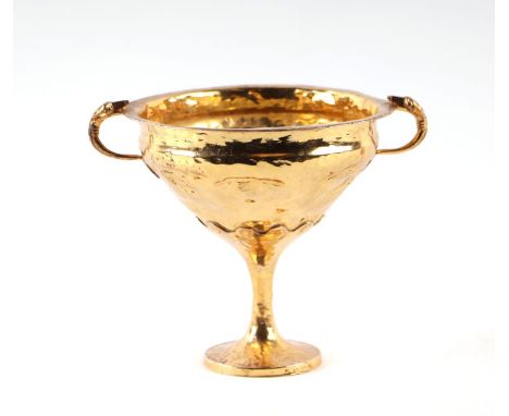 A silver gilt Minoan style cup, stamped '925' to the base rim, 12cms high.