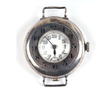 A WWI Rolex Officer's trench watch in silver half hunter flip-top case, the white enamel dial with Arabic numerals and subsid