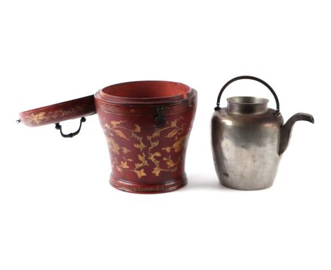 A Chinese tinned metal kettle and cover, 14cms high, within a red lacquer case with gilded decoration, 19cms diameter.Conditi