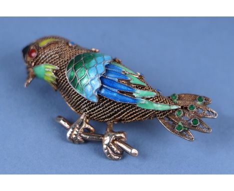 A Chinese enamel silver metal gilt brooch modelled in the form of a bird.