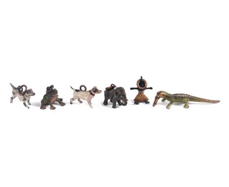 A group of unusual antique Vienna cold painted bronze miniature animal charms to include a black girl, crocodile and Jack Rus