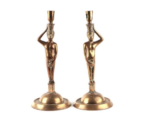 A pair of 19th century Italian Venetian polished bronze figural candlesticks of Renaissance design, 32cms high (2).