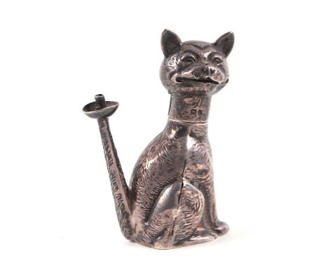 An Edwardian novelty table cigar lighter in the manner of Louis Wain depicting a seated cat, Birmingham 1906, 6cms high.Condi