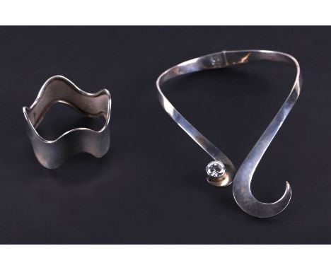A Mexican sterling silver torc necklace; together with a similar bangle (2).