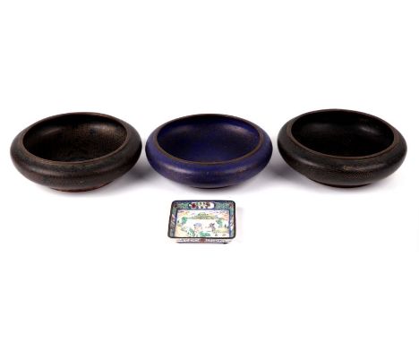 Three Chinese cloisonne bowls, two on a black ground and one on a blue ground, two with four character marks to the underside