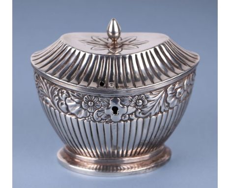 A 19th century Dutch silver metal navette form tea caddy with repousse floral band and reeded decoration, 244g, approx 12cms 