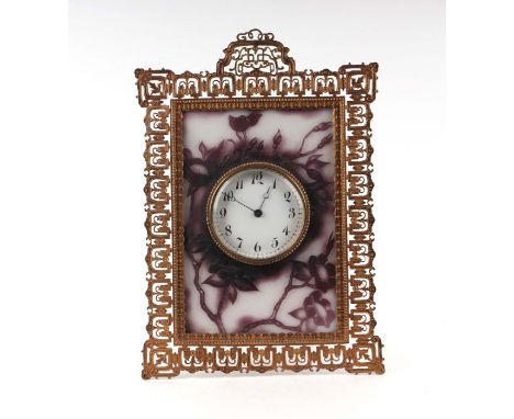A late 19th century French cameo glass strut clock in the manner of Émile Gallé mounted in a pierced gilt metal frame, 34cms 