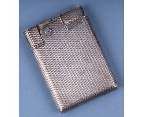 An Asprey silver wafer cigarette lighter with engine turned decoration, London 1918, 75g.