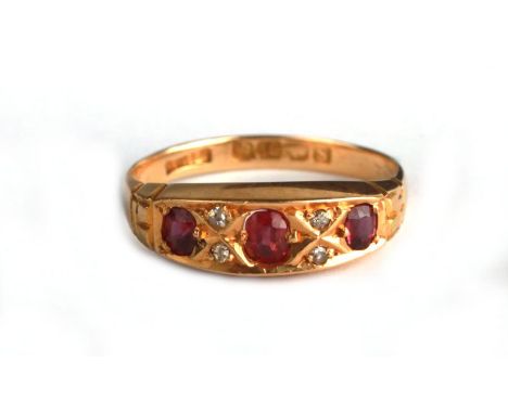 An 18ct gold ruby and diamond half hoop ring, Birmingham 1917, approx UK size 'Q', 3.2g.Condition ReportShank is ok, not thin