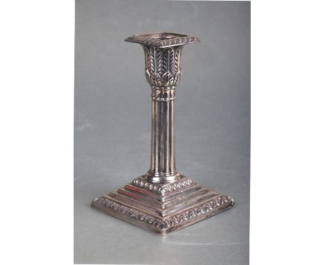 A Victorian dwarf silver candlestick on square stepped base, Sheffield 1887, 14cms high.
