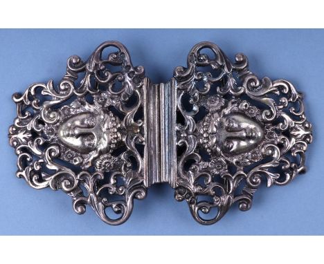 A Victorian silver nurses buckle, cast in two pieces in the form of Medusa heads, London 1894. Condition ReportMaker William 