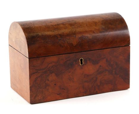A Victorian walnut dome topped two-division tea caddy, 22cms wide.