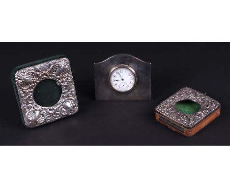 A silver mounted desk top strut clock, the white enamel dial with Arabic numerals and subsidiary seconds dial, Birmingham 192