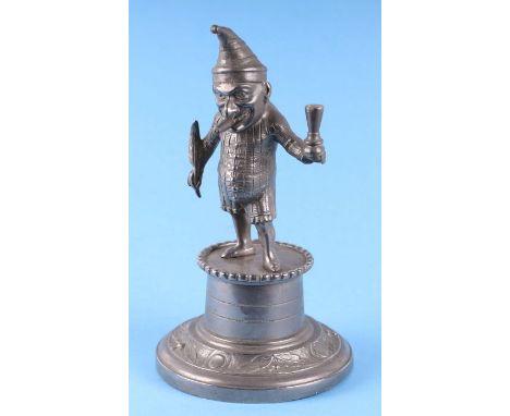 A Public House figural bar lighter in the form of Mr Punch, 19cms high.