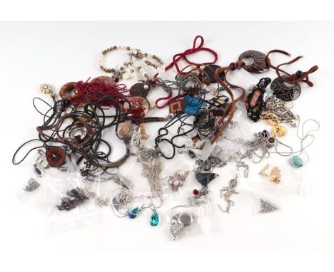 A quantity of vintage and modern costume jewellery to include necklaces and earrings.