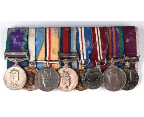 A court mounted Royal Artillery medal group of eight, consisting of from left to right: General Service Medal with Northern I