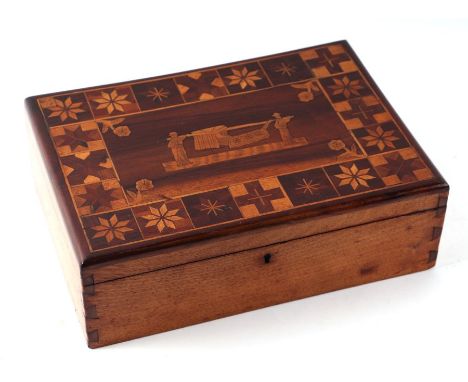 A specimen wood jewellery box, the cover with parquetry and marquetry inlaid decoration, opening to reveal a fitted interior,