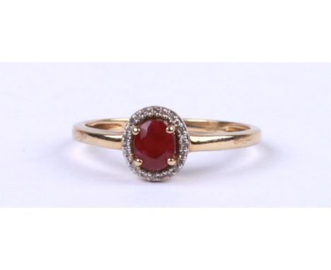 A 9ct gold diamond and ruby ring, approx UK size 'O',1.8g.Condition ReportShank is somewhat thin