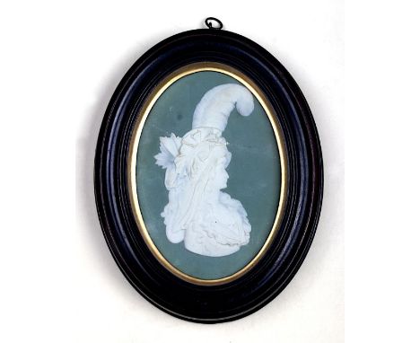 An 18th century Wedgwood green Jasperware portrait plaque depicting Princess Caroline of Brunswick, wife of George III, in or