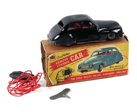 A Chad Valley remote control car, boxed, 19cms long.