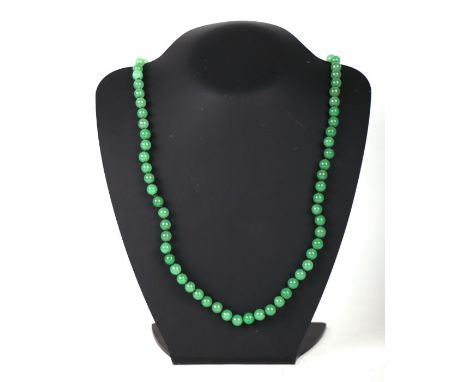 A green jade/ hardstone graduated bead necklace.