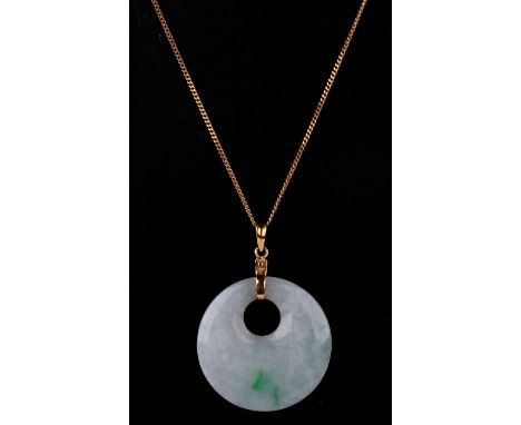 A Chinese yellow metal mounted pale jade pierced disc pendant on a fine 18ct gold chain. Chain weight 2.6gCondition ReportThe
