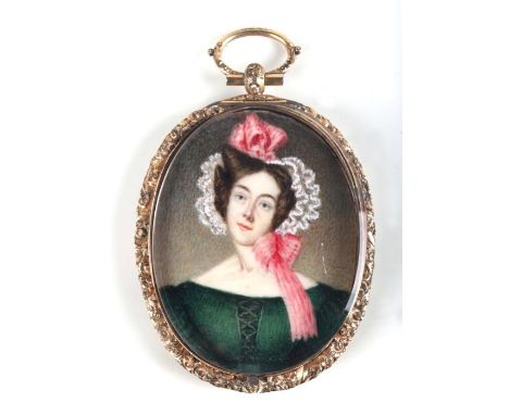 An early Victorian portrait miniature depicting a lady wearing a green dress, in a gilt frame with woven hair plait to verso,