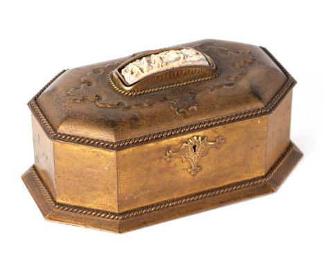 A 19th century Grand Tour octagonal form gilt metal jewellery casket and cover, the cover inset with a shell cameo plaque dep