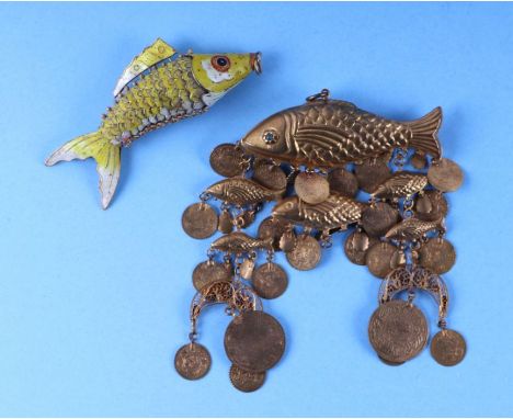 A Chinese cloisonne articulated fish, 11.5cms long; together with an Indo-Persian gilt metal hanging fish with medallion coin