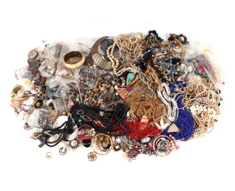 A large quantity of vintage costume jewellery.