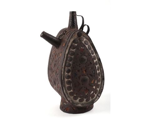 A Balkan fretwork and punch decorated steel and cloth on wood aquamanile water flask, probably 17th century, 28cms high.Condi