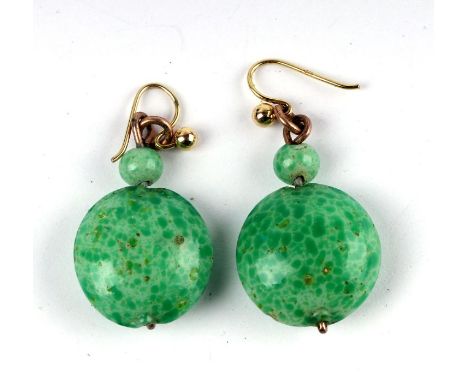 A pair of 9ct gold jade like drop earrings.