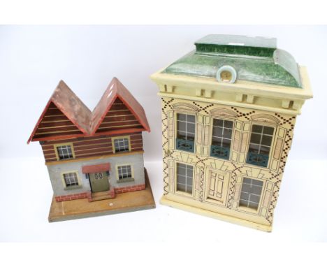 Two vintage dolls houses. One chalet style with double eves and  French town house with a green roof. Max. H52cm