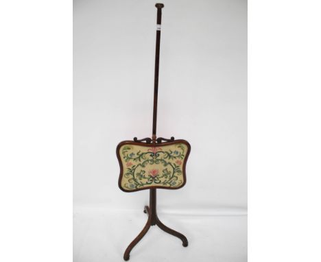 A mahogany inlaid pole screen. With a tapestry panel, H137cm