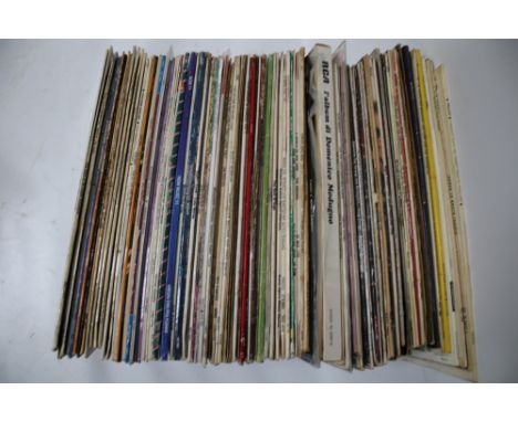 A collection of vintage vinyl LP 33 RPM records. Including '007' film music performed by Eric Winstone, Elvis Christmas Album