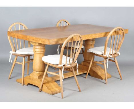 A modern solid oak refectory style dining table, height 76cm, length 168cm, depth 91cm, together with a set of four Ercol sty