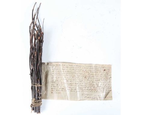 A 19th century tied bundle of birch sticks with attached manuscript note relating to 'The Birch Rod, a 'Relic' of Barbarism a