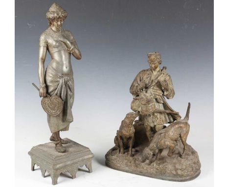 A late 19th century cast spelter figure of a standing lady wearing Eastern costume, height 50cm, together with another 19th c