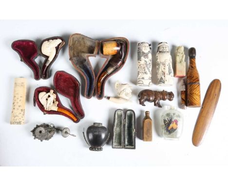 A group of four 19th century carved meerschaum pipes, three with cases (some faults), together with a group of other collecto