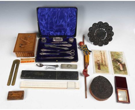 A mixed group of collectors' items, including a small leather cased daguerreotype portrait of a gentleman, an engraved wooden
