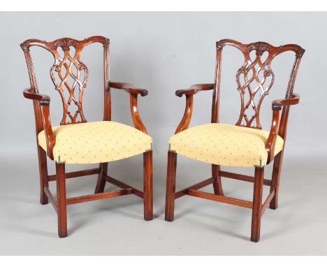 A set of ten late 20th century Chippendale style hardwood dining chairs by Frank Hudson &amp; Son, retailed by Harrods, compr