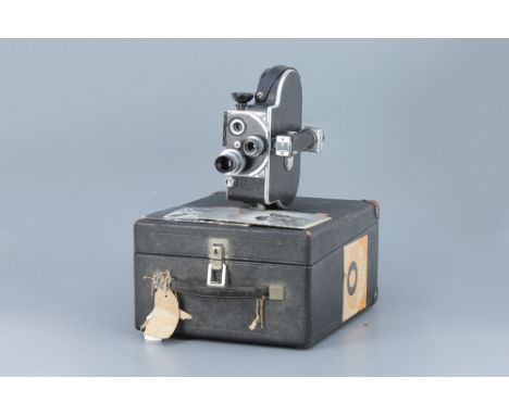 A Bolex H16 Cine Camera, with Dallmeyer Speed f/1.5 1" and f/1.9 15mm lenses, motor working, some fungus to lenses, in fitted