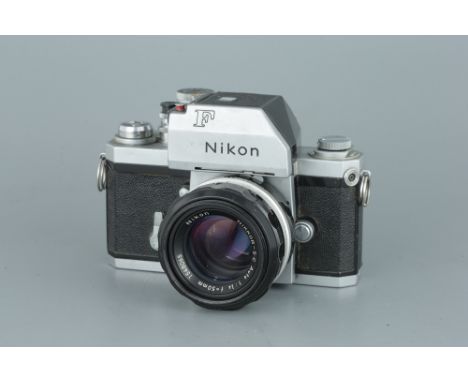 A Nikon F SLR Camera, chrome, serial no. 6723085, with Nikkor-S.C. f/1.4 50mm lens, body, F, shutter working, lens, G, some i