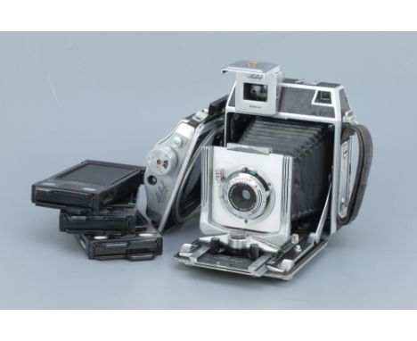 A Linhof Technika IV Medium Format Camera, black, with an Angulon f/6.8 65mm lens, body, F-G, RF patch good, lens, G, shutter