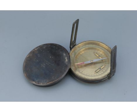 Surveyors Compass, English, dated 1934, signed Troughton &amp; Simms, London, with folding sights, polished brass compass, tw